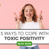 Graphic that reads "5 Ways to Cope With Toxic Positivity" from Grief Recovery Center Therapists in Houston Texas over a stock photo of a woman crossing her fingers in front of a pink background.