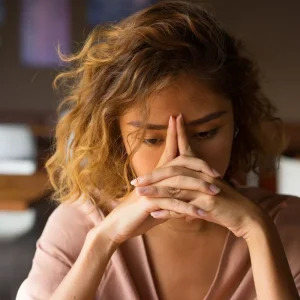 person navigating the five stages of grief