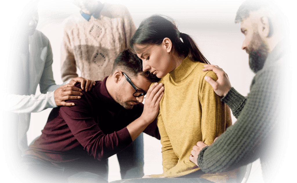 person comforting another person